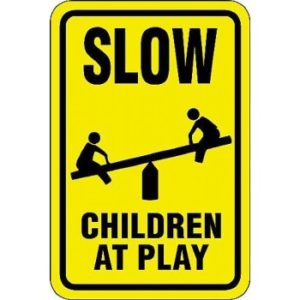 slow_children_at_play_w-_teeter-totter_symbol_sign-933-1